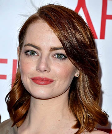 Emma Stone's Side-swept Auburn Locks