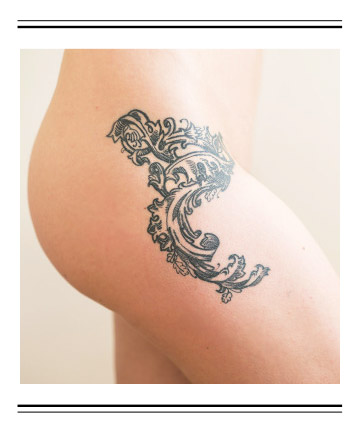 Bold Scrollwork Tattoo